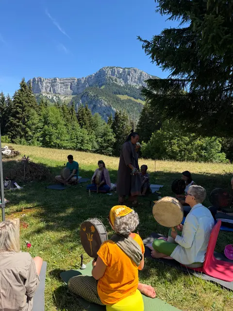 Group session in the mountain pastures during a retreat