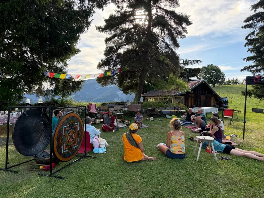 Group session in the mountain pastures during a retreat