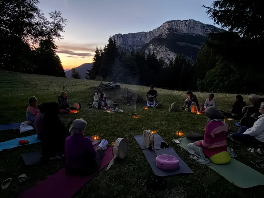 Night ceremony in a circle of candles