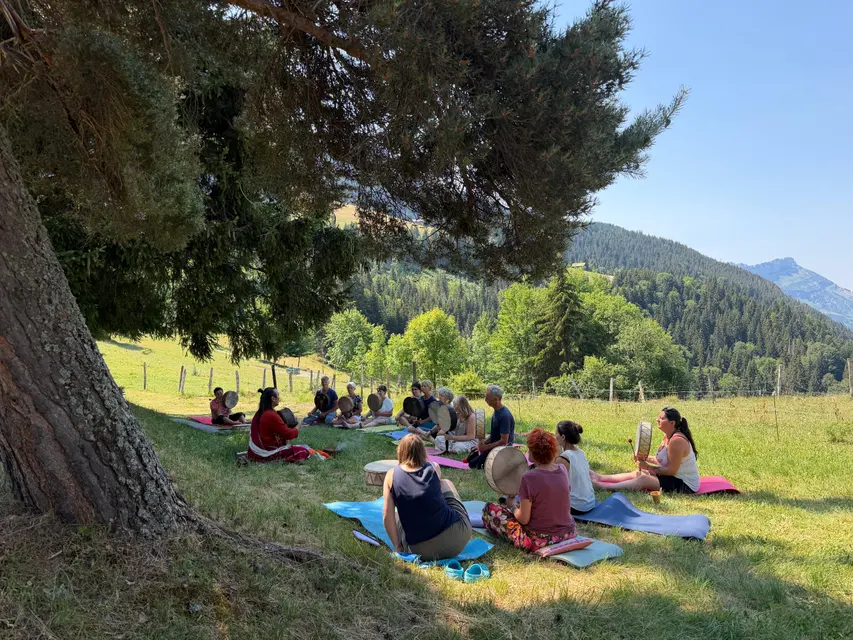 Group session in the mountain pastures during a retreat