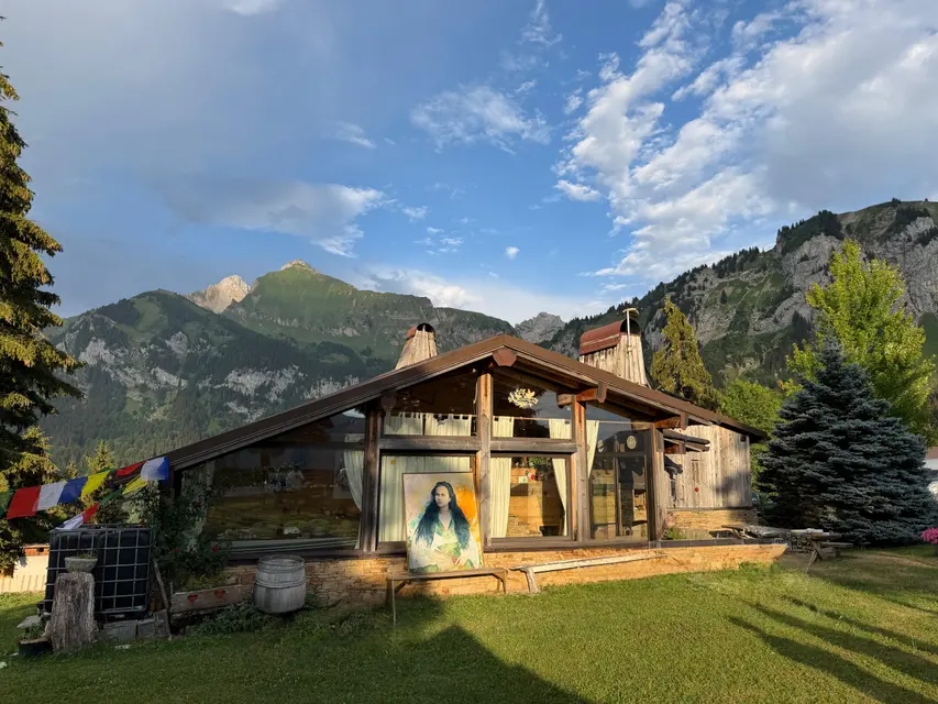 The retreat site: yurt and chalets facing the mountains