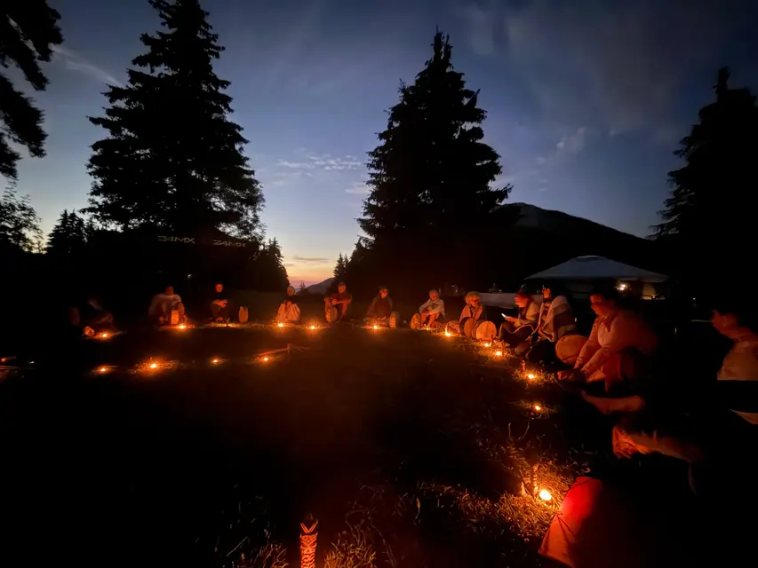 Night ceremony in a circle of candles