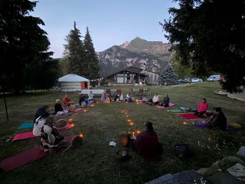 Group session in the mountain pastures during a retreat