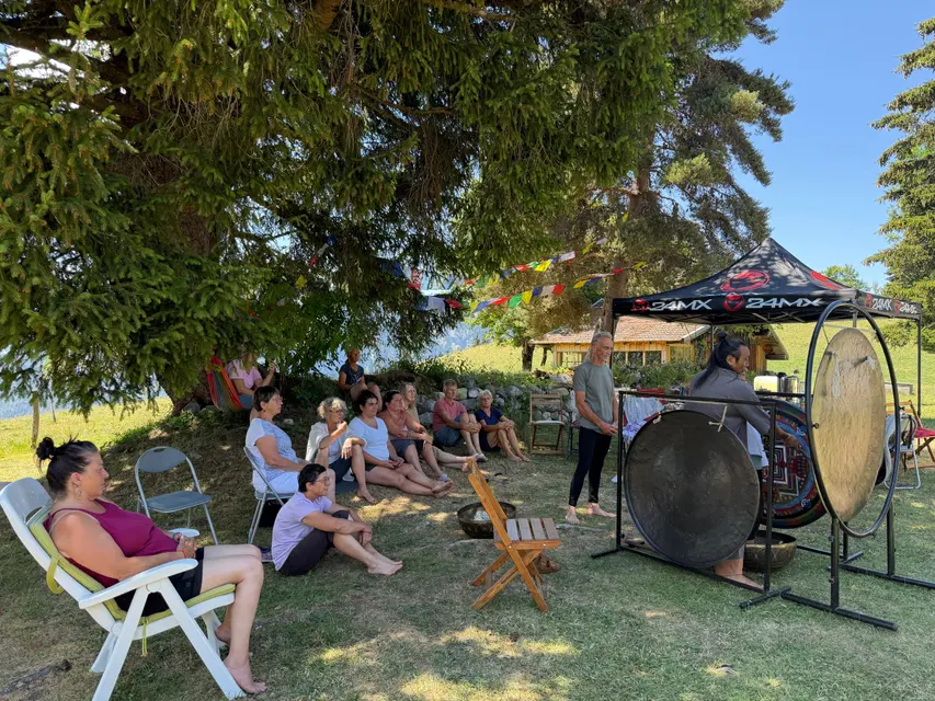 Group session in the mountain pastures during a retreat